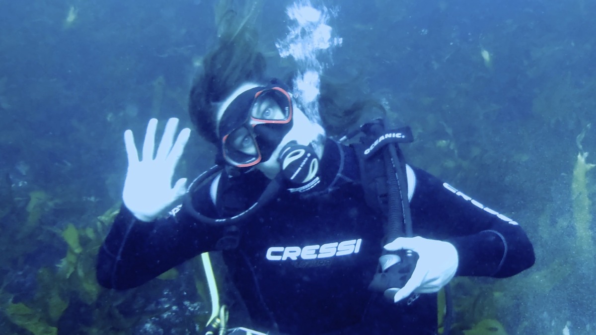 Me waving underwater